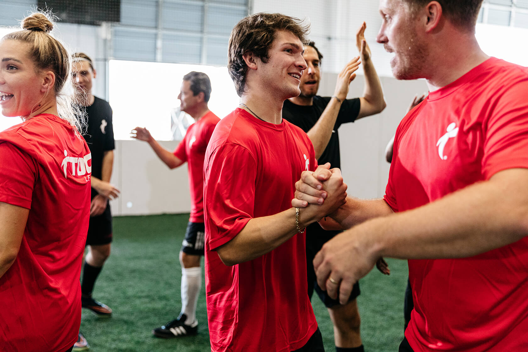 Group handshake after soccer game